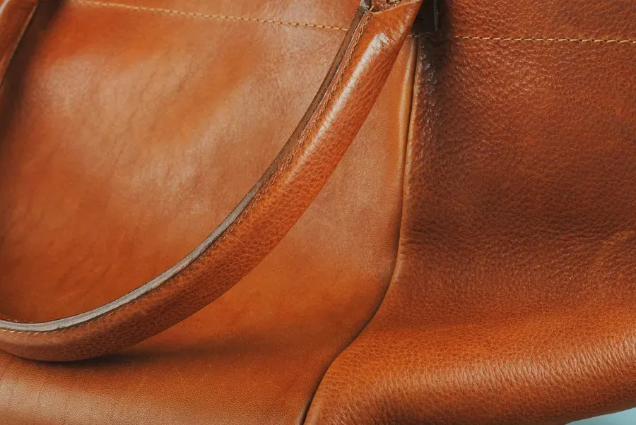 Close detail of brown leather bag