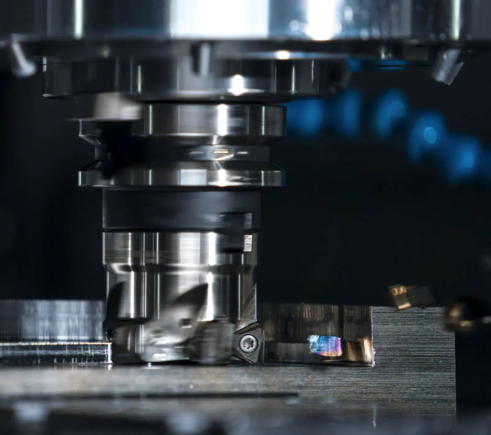 Milling tool cutting a metal workpiece