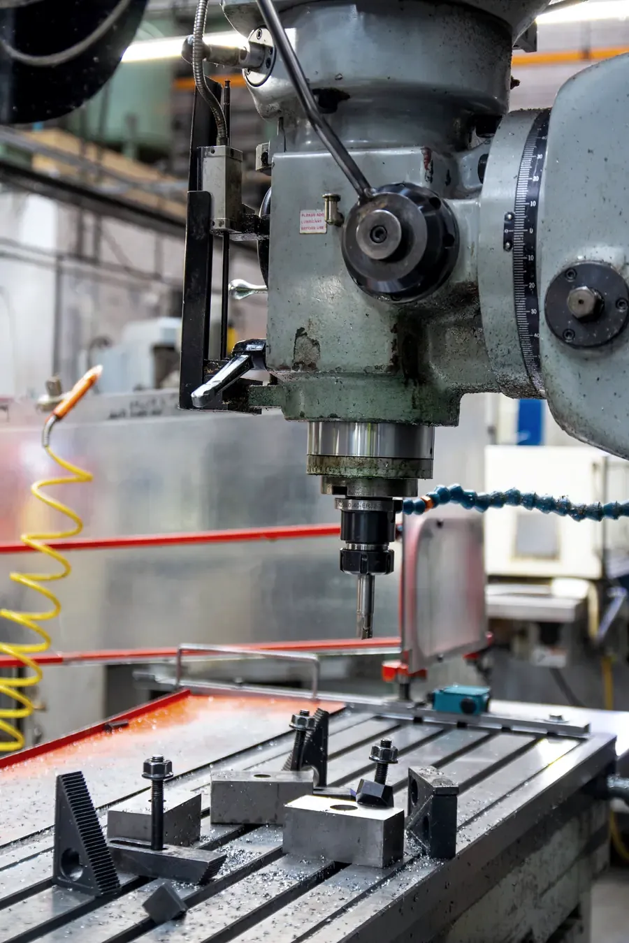 Lathe shaping a metal component