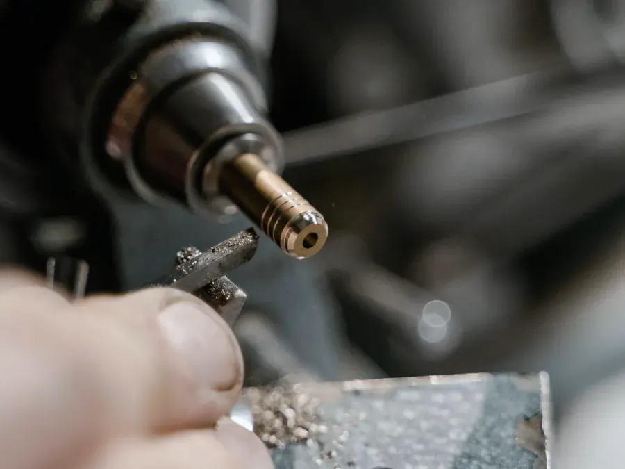 Close view of a metal part being polished